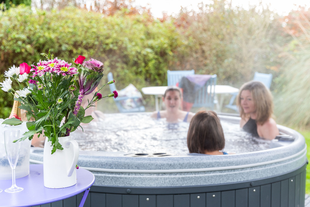 Three women in a hot tub