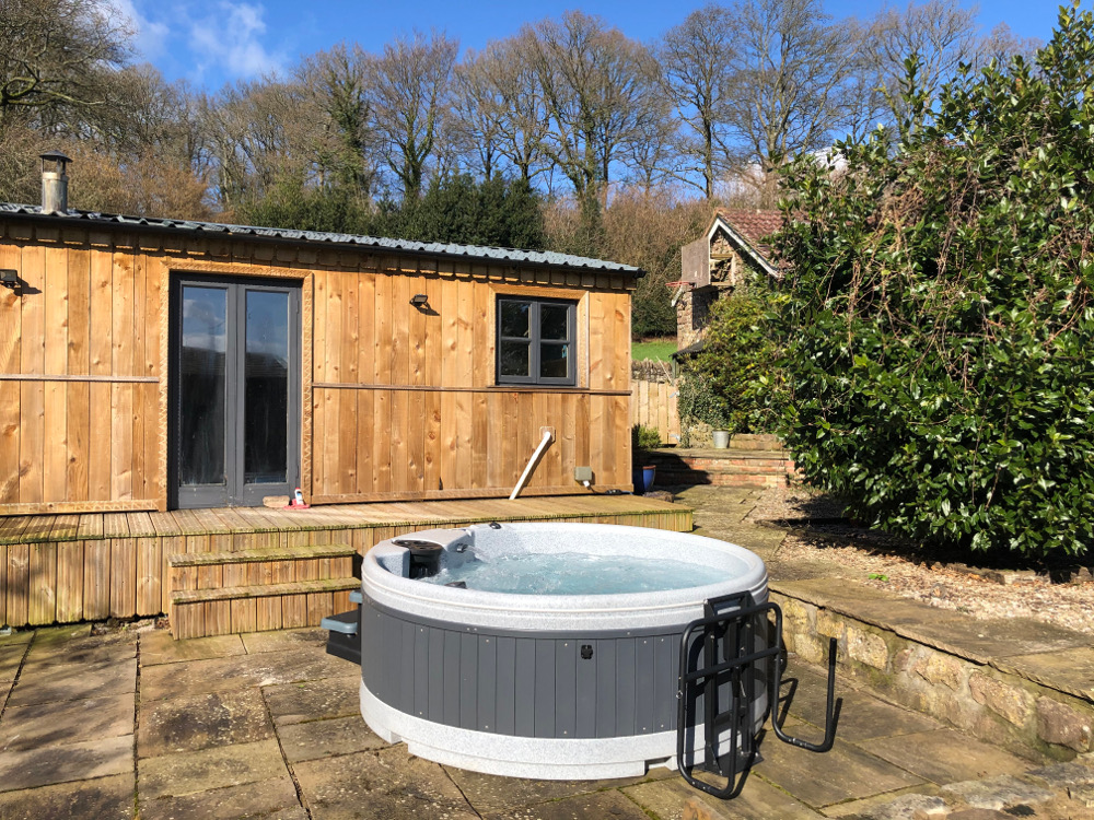 Hire a hot tub solid tub on patio